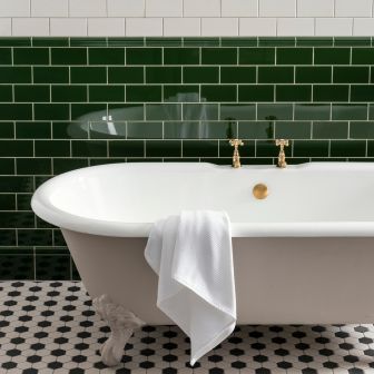 Vintage White Half Tile (above) Edwardian Green Albert Dado and Vintage White Half Tile (middle) Edwardian Green Skirting Tile (below) Porcelain White Black Hexagon Checker (floor)